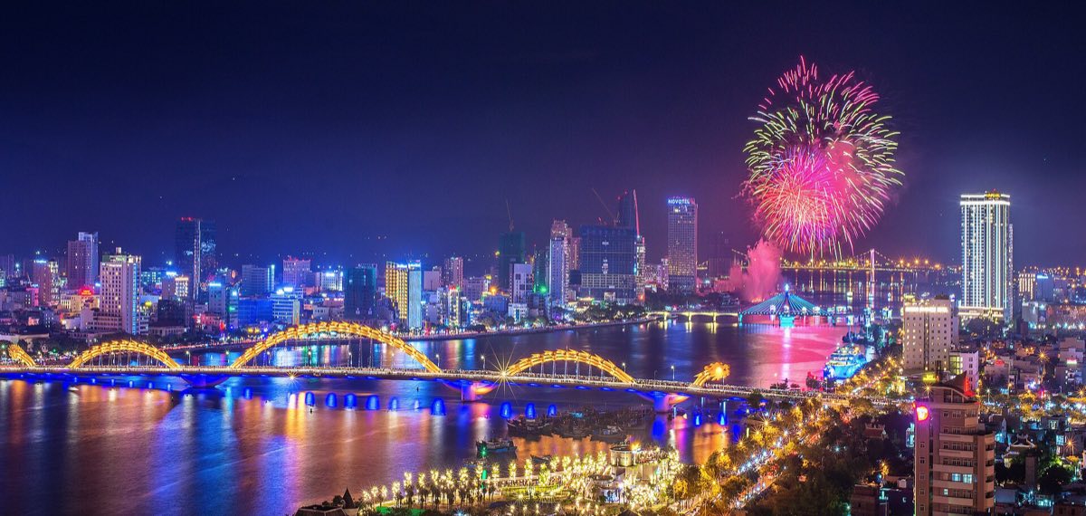 The Dragon Bridge lit over the Han River in Da Nang at night